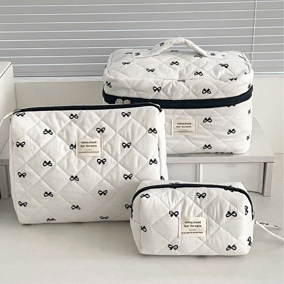 Large Capacity Butterfly Knot Makeup Bag Handheld Storage Bag Cute Black Wash Bag High Aesthetic Value Travel Essential