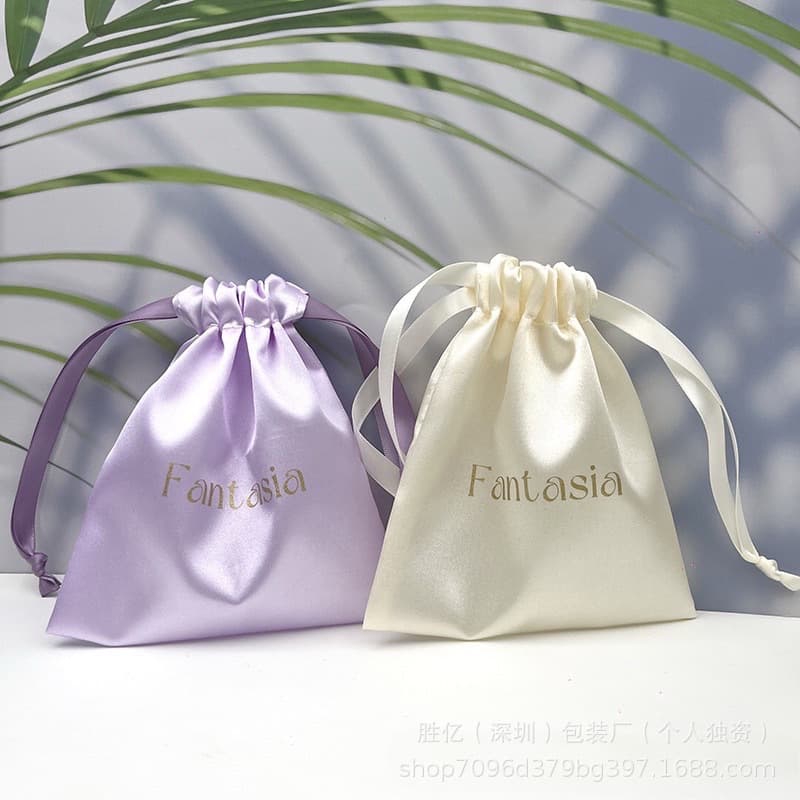 Custom pink satin pocket storage for women's bags, dust-proof satin packaging drawstring bag with logo.