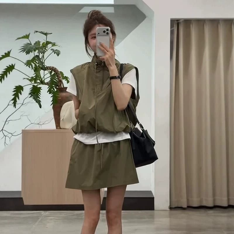 Korean version fake two-piece short-sleeved T-shirt vest and skirt two-piece set for women summer 2026 fashionable vest short skirt suit