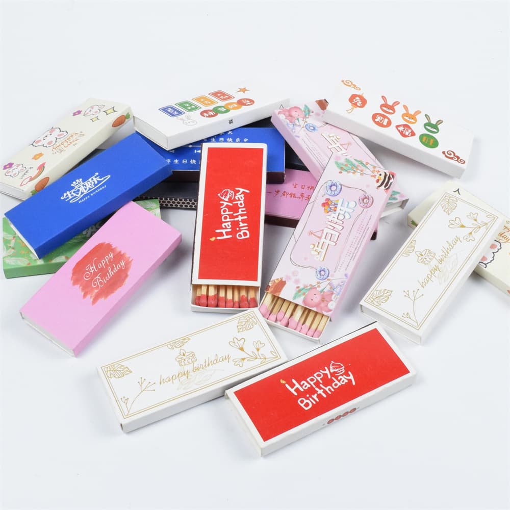 Ready-to-ship birthday matches in assorted colorful boxes, featuring cute rabbit designs for cake and bakery shops, wholesale distribution for scented candles.