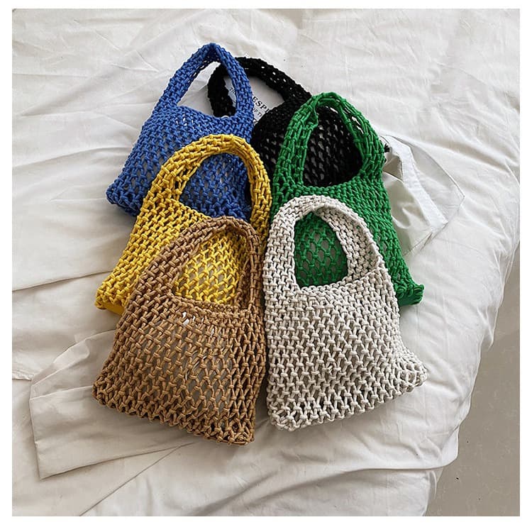 Wholesale new women's handbag Korean style ins fashion foreign style hollow wrist bag handwoven women's bag Korean version