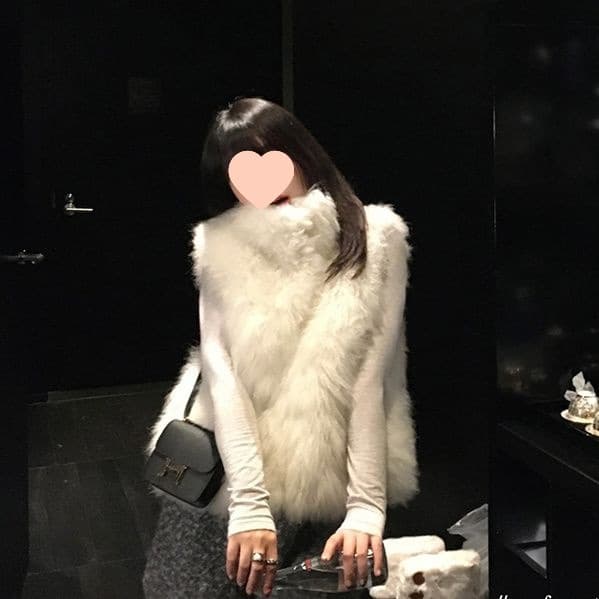 A structured, flattering vest with dropped shoulders that suits all heights and is versatile enough for women to wear. It features a fox fur faux fur lining.