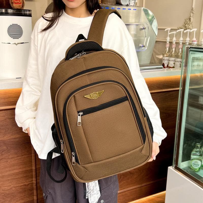 Brown matte color, literary style travel backpack for young adults, suitable for business trips, students, campus activities, and dirt-resistant school bag