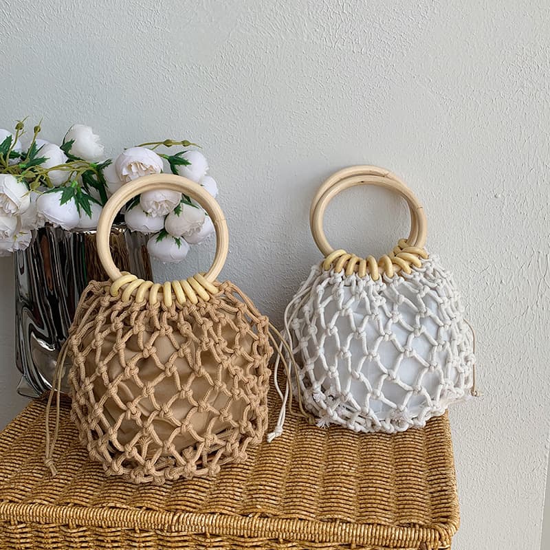 handbags holiday style hollow fishnet hand bucket bag women's 2026 summer new handwoven bag beach bag