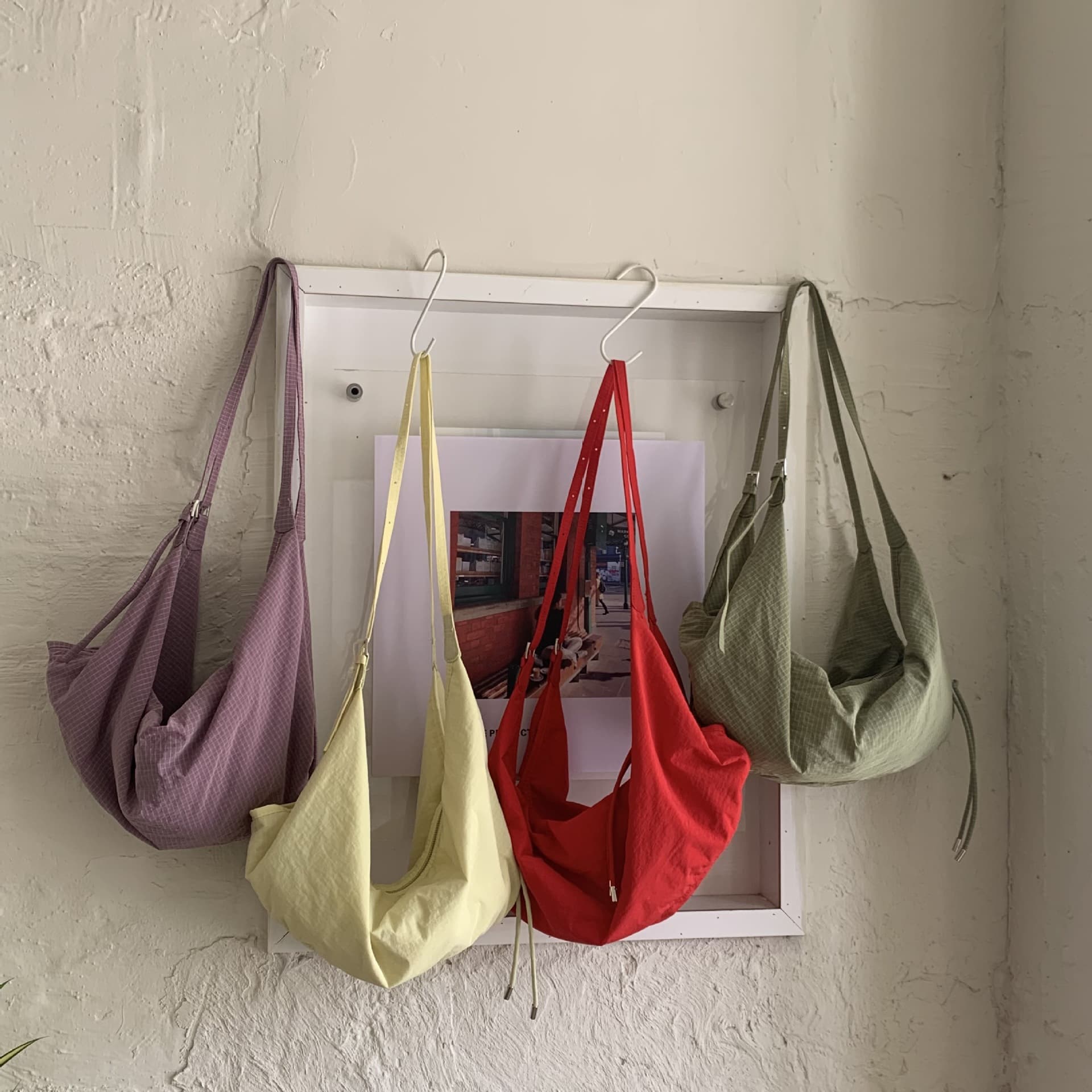 Japanese and Korean nylon cloth niche shoulder bags, simple and fashionable bags, large-capacity trendy dumpling bags, modern daily commuter bags