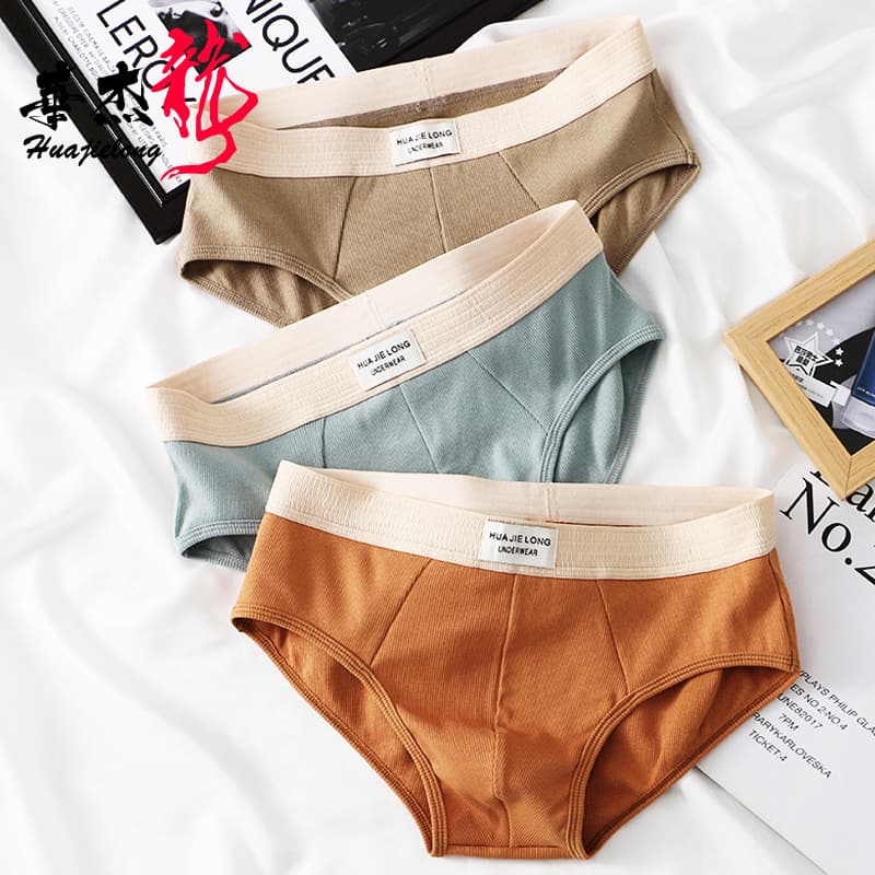 Huajielong New Spring Solid Color Men's Underwear Multi-Color Wholesale Mid-Rise Trendy Breathable Briefs Drop Shipping
