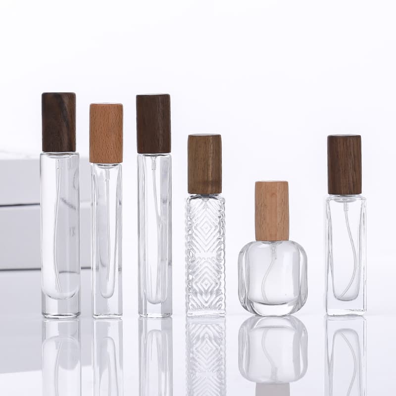 Perfume dispenser with wooden cap, high-end agarwood aromatherapy bottle, glass perfume bottle manufacturer, solid wood