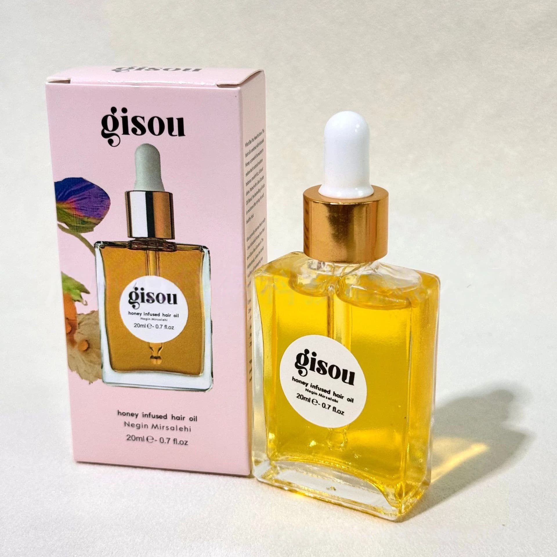 New cross-border honey hair oil refreshing, nourishing, glossy, moisturizing, smoothing, repairing dryness gisou essential oil