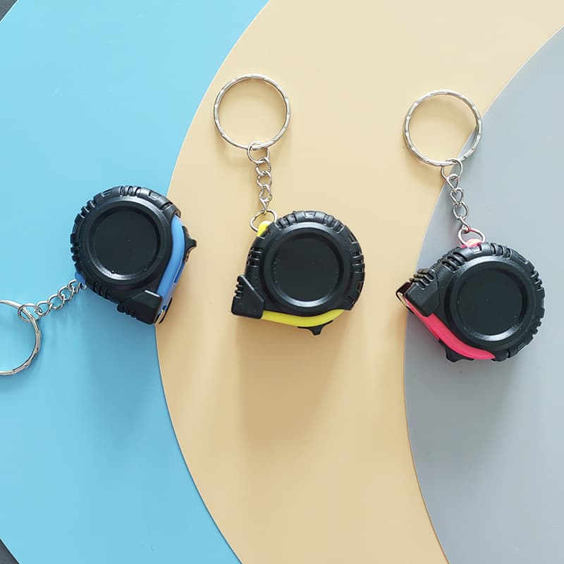 Custom keychain metric-imperial 1m small steel tape measure with rubber sleeve, eco-friendly 3FT gift mini tape measure.