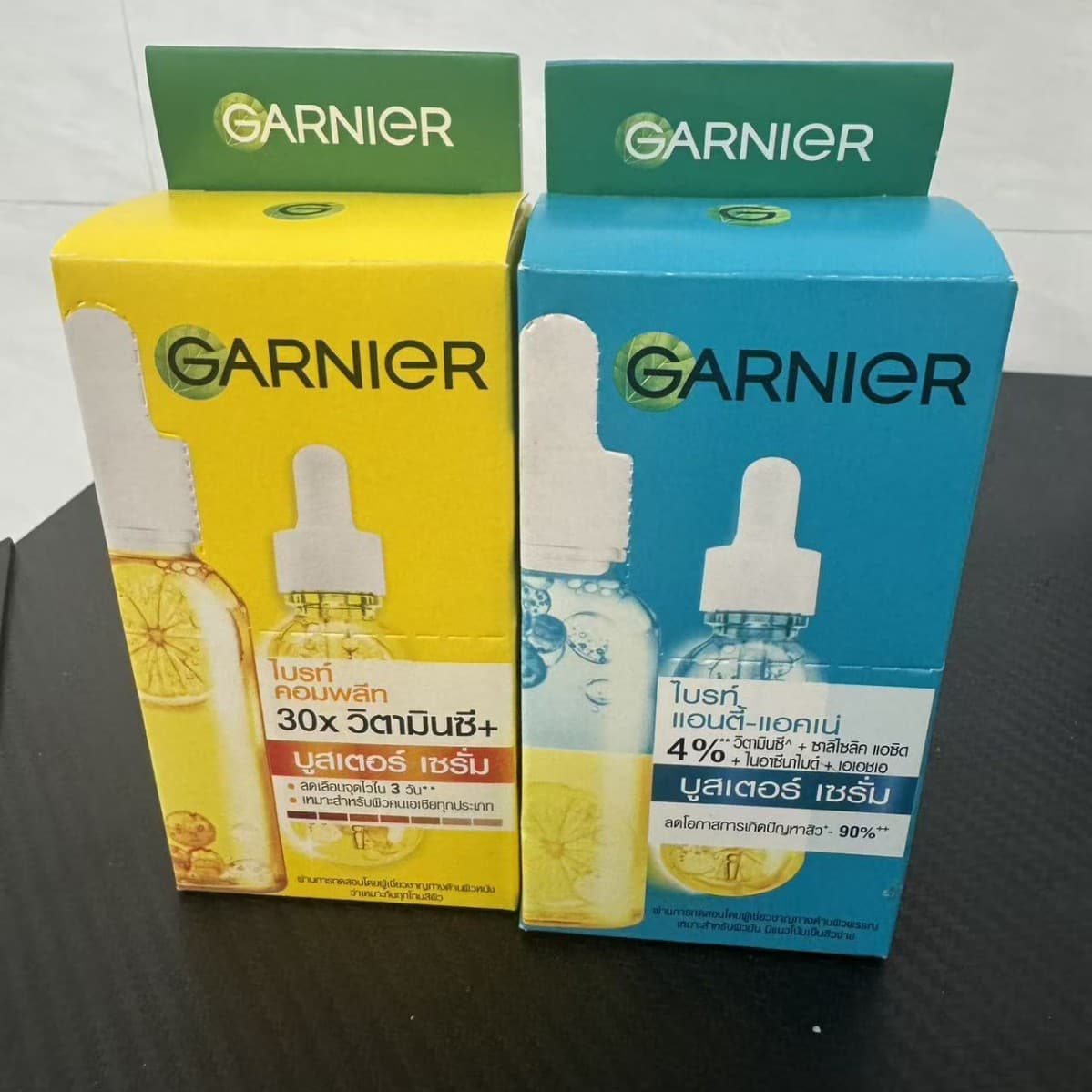 Thailand Garnier Garnier essence amine 377 brightens skin tone and fades acne marks essence 30ml can be sent on behalf of others