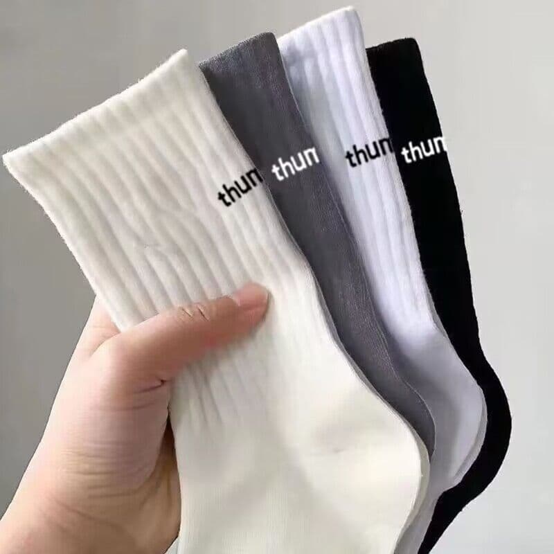 Men's mid-calf casual socks for spring and autumn, odor-resistant, sweat-absorbent, lettered sports basketball socks, men's black and white knee-high socks