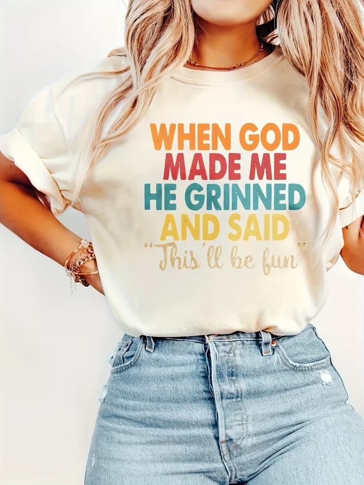 When creating me, he grinned, women's T-shirt, funny religious quote on beige