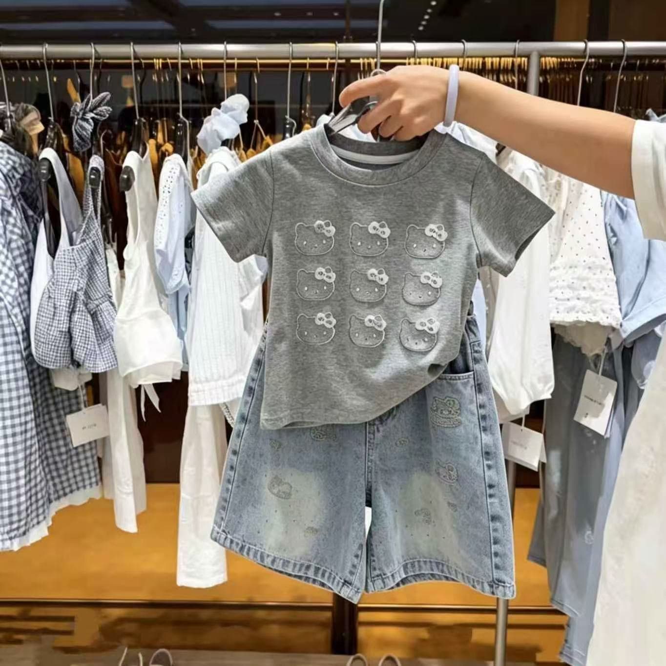 Girls summer suit new style sparkling laser KT cat short-sleeved top children's embroidered hot diamond jeans two-piece set