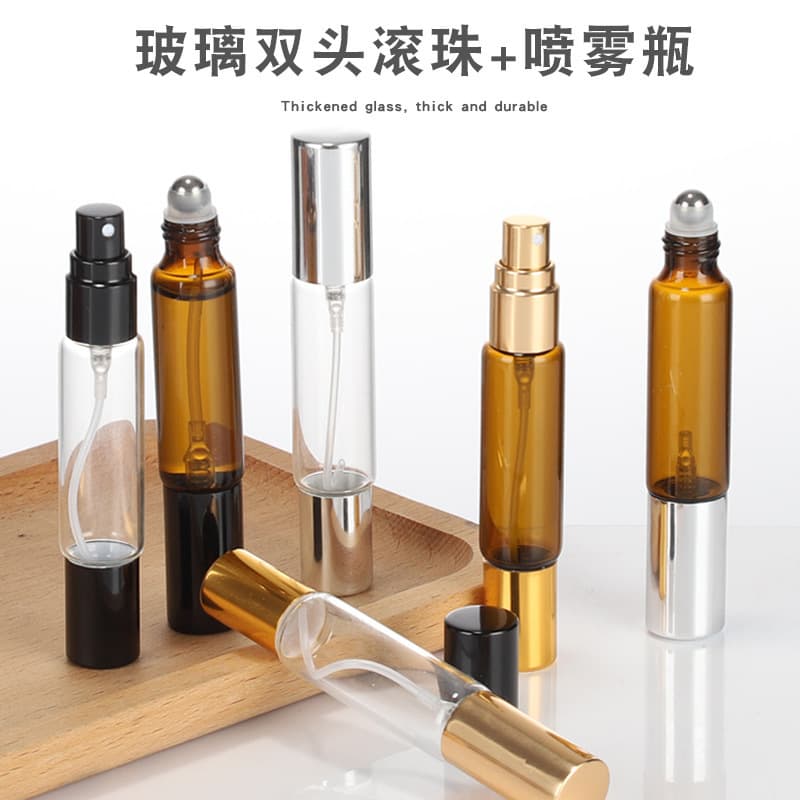 Wholesale popular double-ended roller ball spray bottles, tea-colored cylindrical perfume refill bottles, convenient cosmetic frosted glass bottles