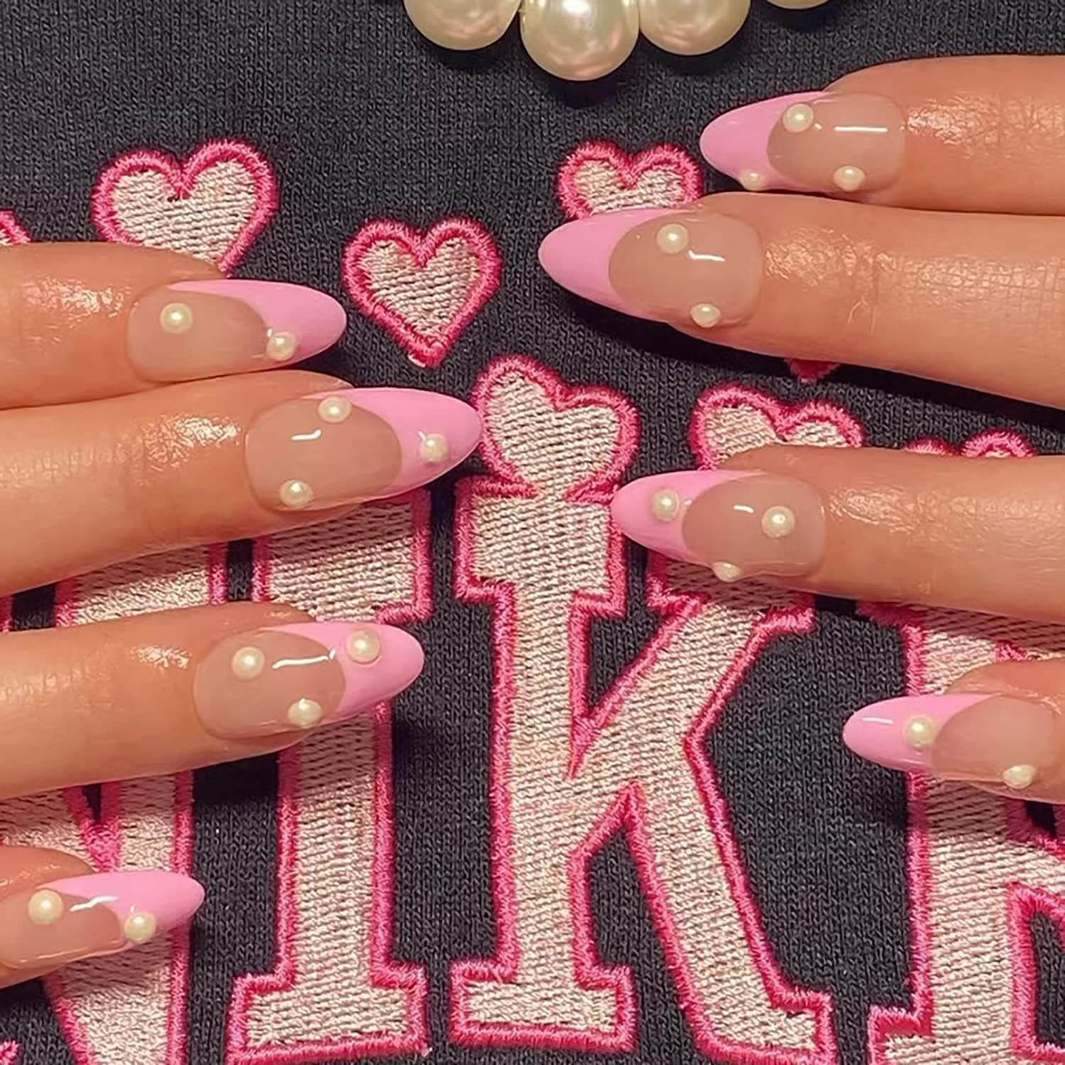 Long pointed press-on nails, medium almond shape, purple French white pearl design, full coverage fake nails