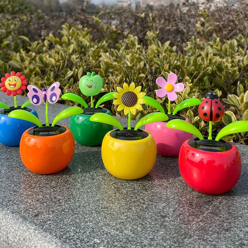 Solar flower car ornaments car interior automatic swing car interior ornaments shaking head apple flower ornaments