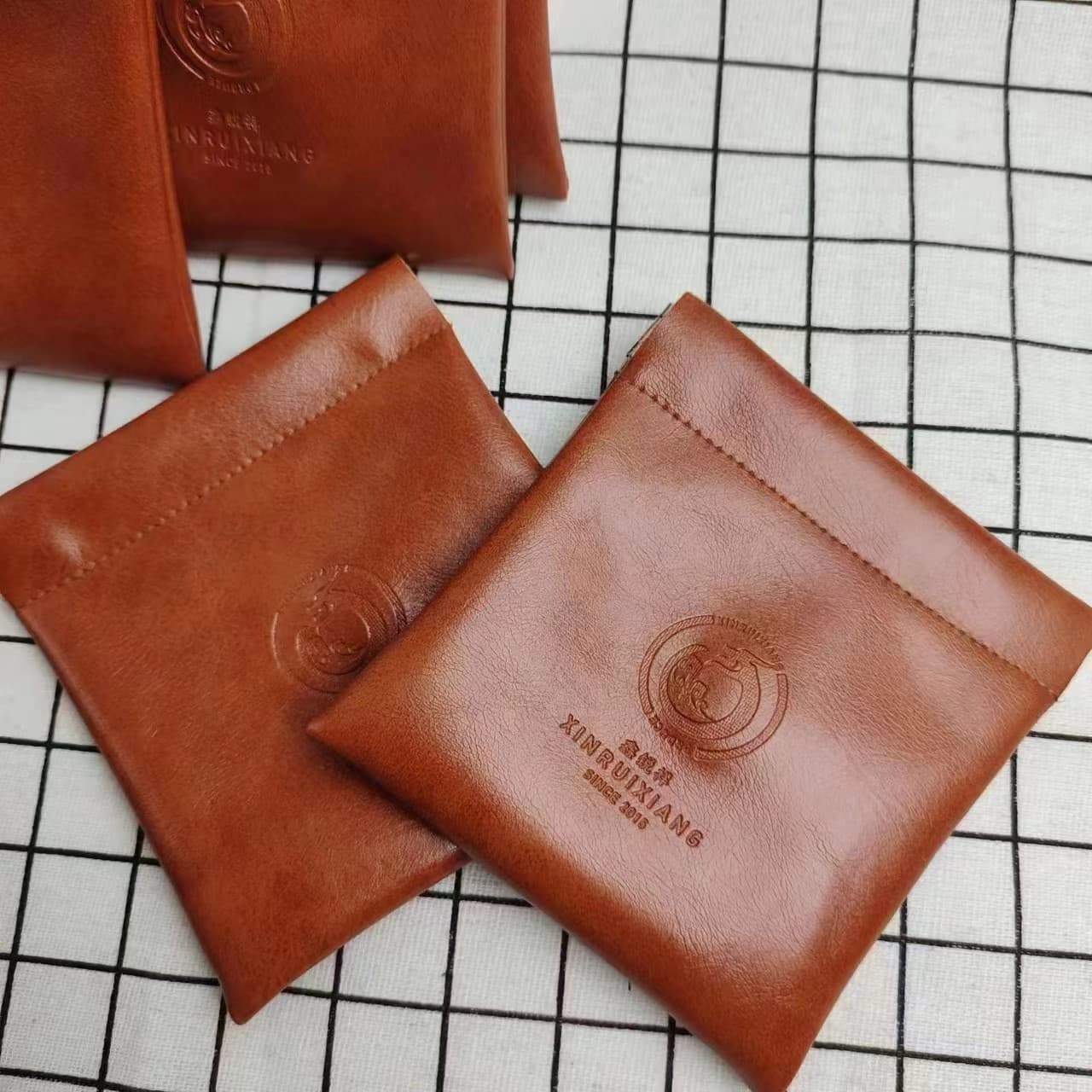 New cute leather automatic closure snap storage bag, portable earphone and data cable snap storage