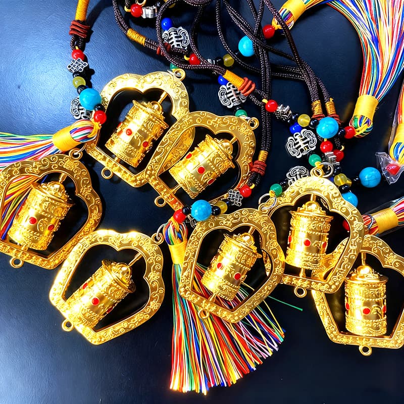 Wholesale factory for scenic spot gifts, accessories, car tassel pendants, Tibetan-style prayer wheels, creative Tibetan alloy car hangings