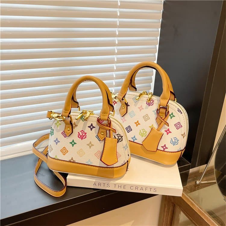 Retro old flower portable shell bag women's 2025 new light luxury niche high-end versatile single shoulder crossbody bag