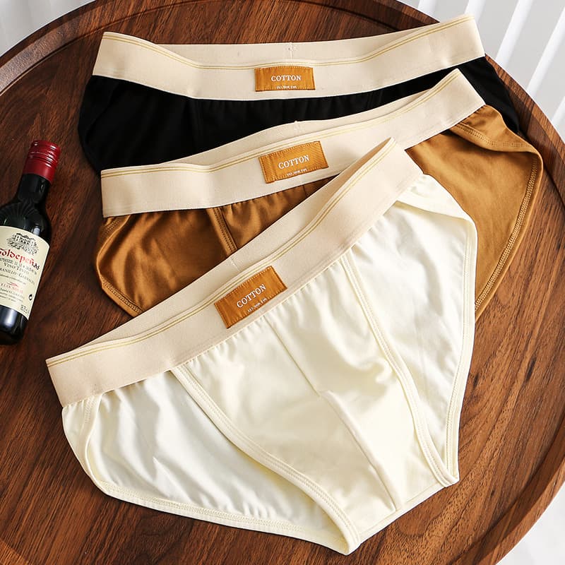 New Huajielong solid color men's underwear, loose fit, cotton briefs, simple and trendy, plus size briefs for men, dropshipping available.