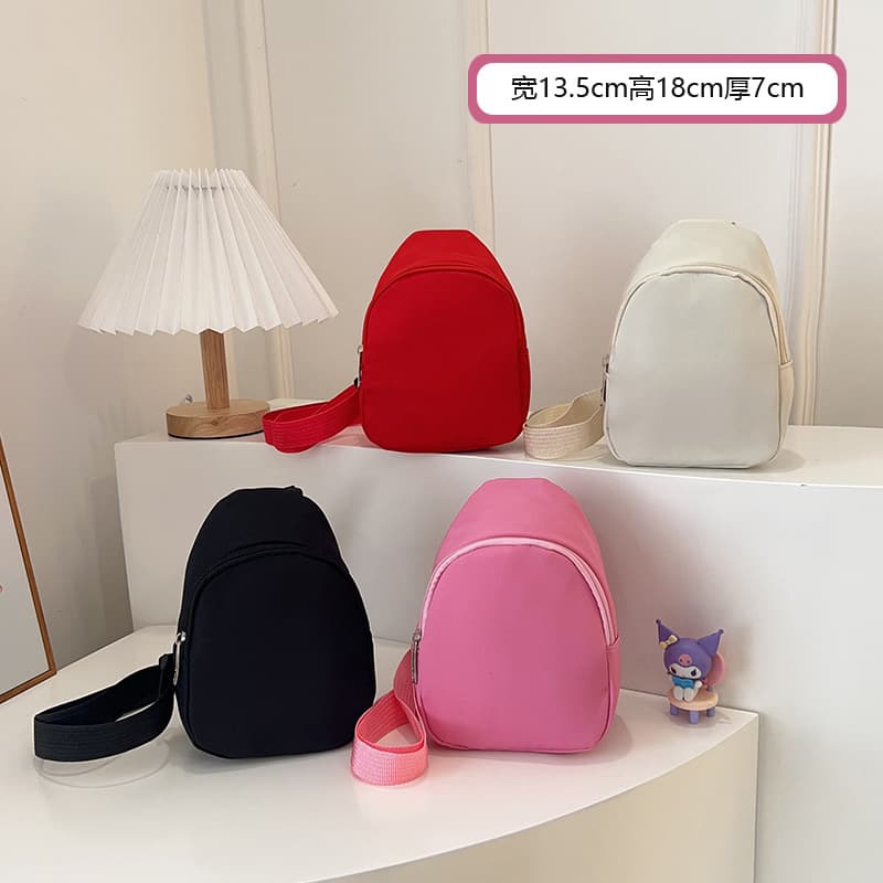 Solid color, simple, trendy, stylish chest bag for kindergarten children, new lightweight shoulder/crossbody bag for little girls.