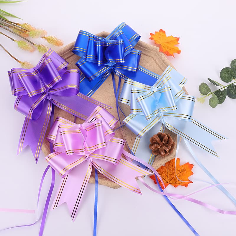 Manufacturer direct 50 bow knots gift box birthday holiday party hand-pull streamers festive roses