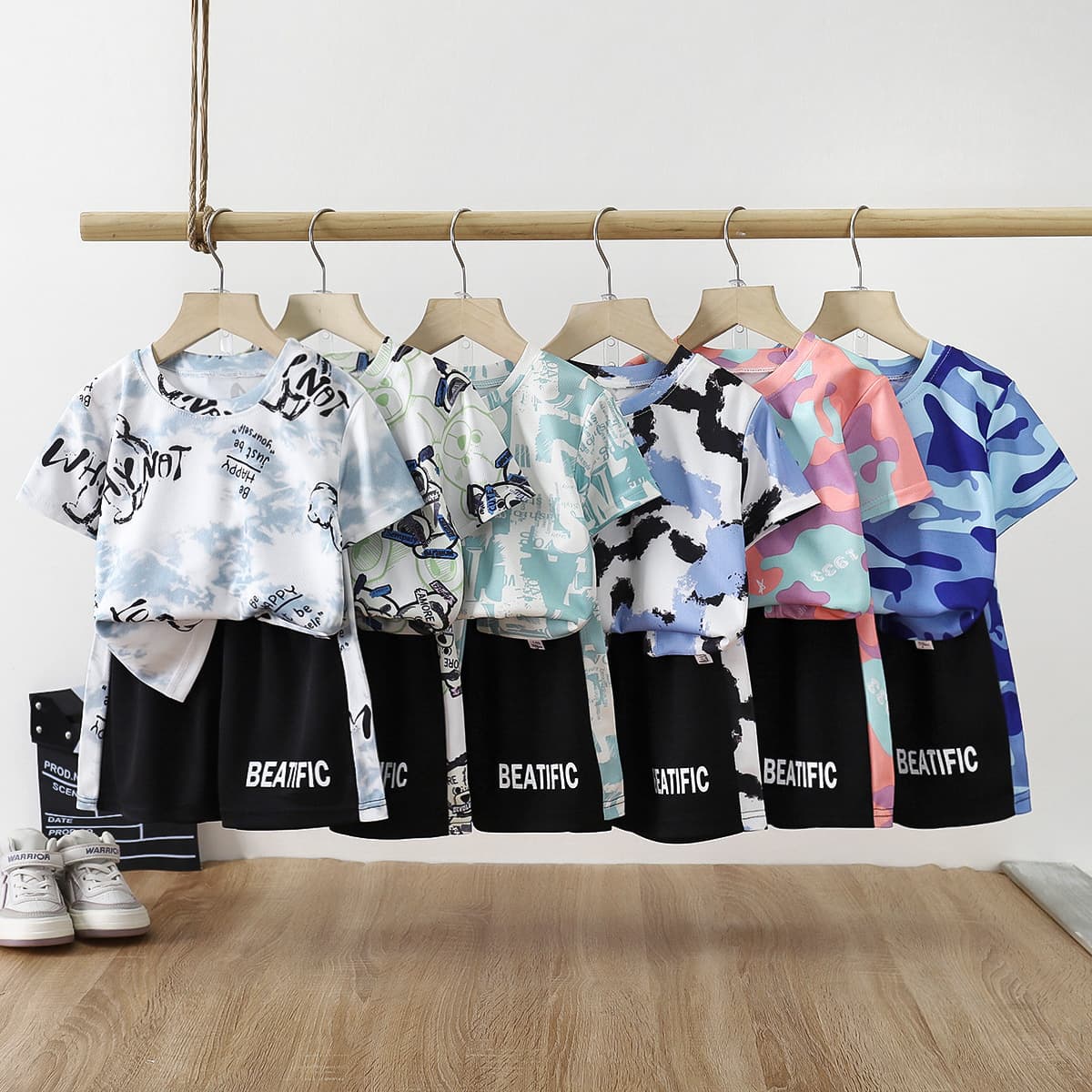 Children's short-sleeved set, new summer style, camouflage short-sleeved shirt and shorts for medium and large children, boys' sportswear, quick-drying clothing, wholesale children's clothing.