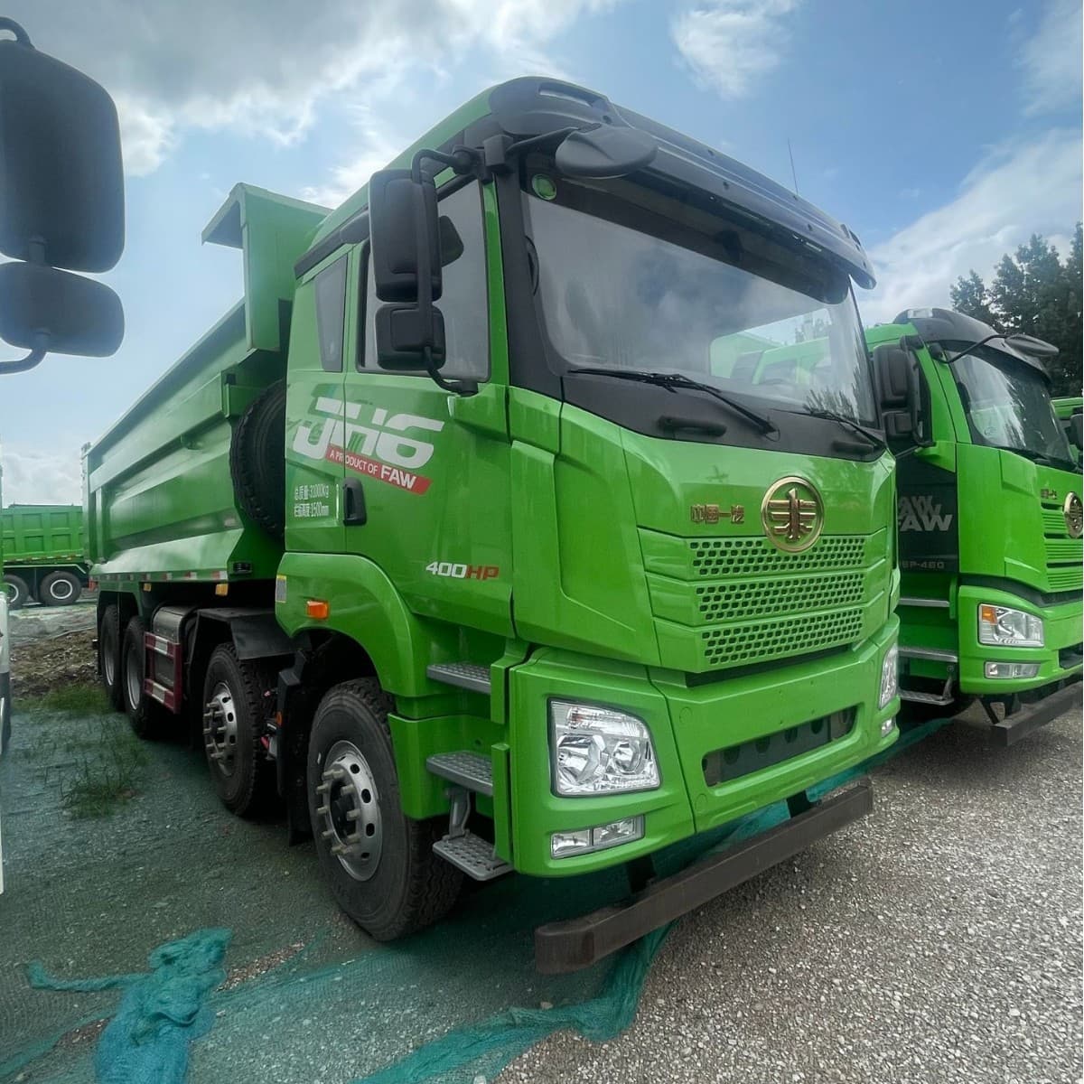 Supply Qingdao FAW Jiefang JH6 dump semi-trailer 12-wheel heavy truck for overseas sales, construction waste dump truck