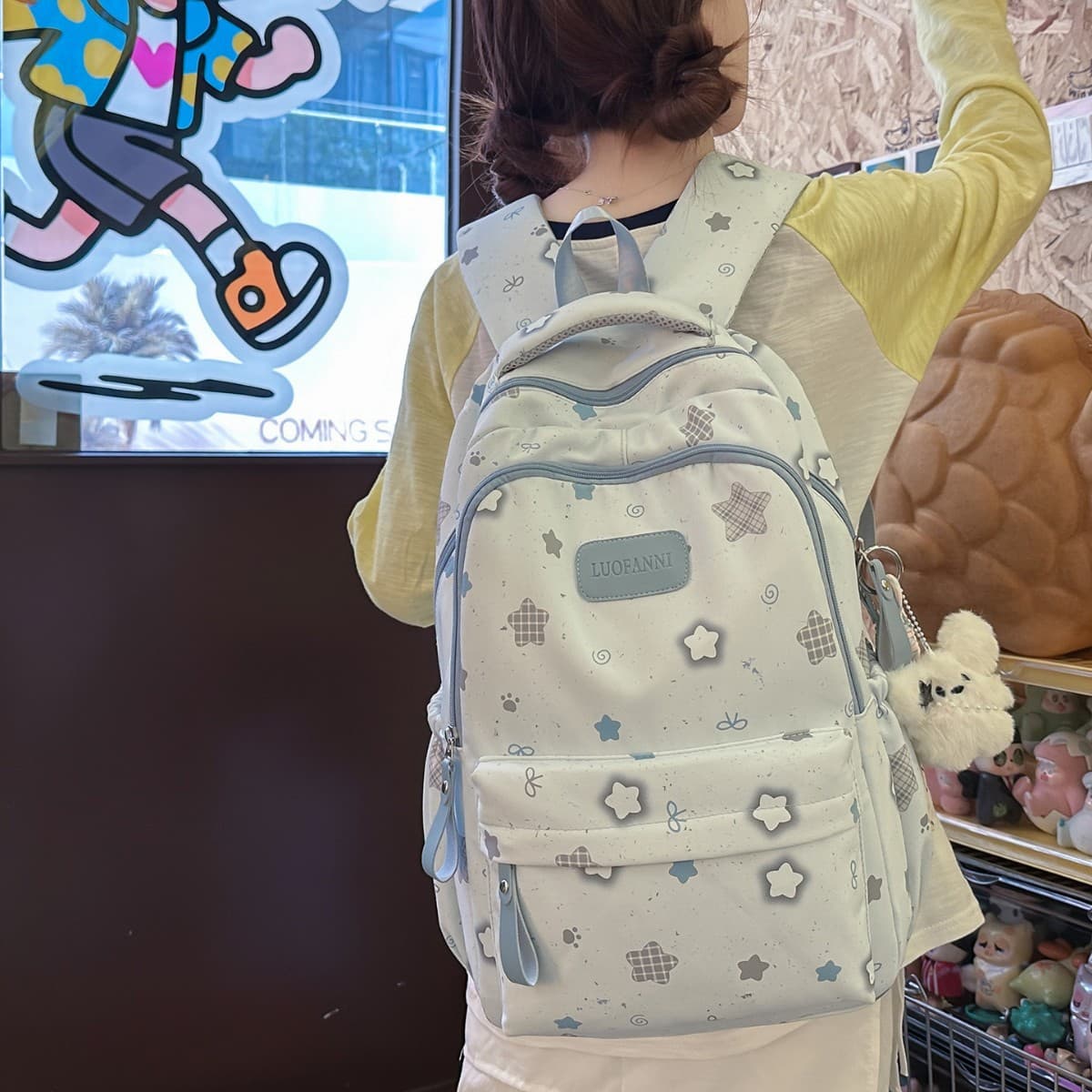 Large-capacity printed star schoolbag junior high school girls third to sixth grade backpack wide shoulder strap large-capacity backpack female