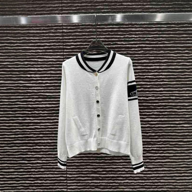Factory direct sale vi25 autumn winter new college style fashion sleeve planet jacquard knit long sleeve cardigan.