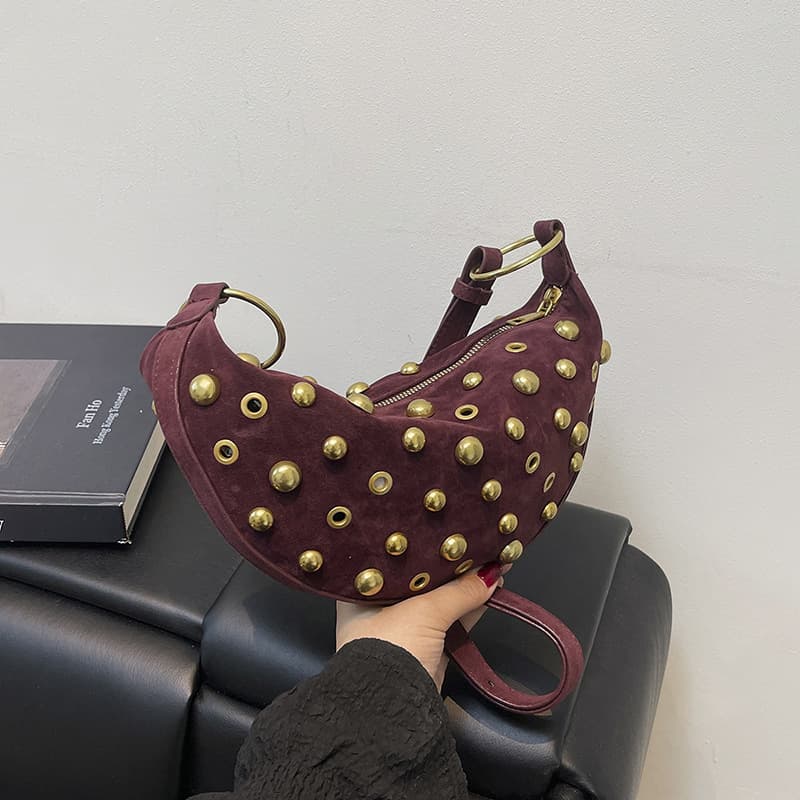 Cross-border corn rivet heavy industry ladies bag punk style 2025 European and American fashion new shoulder armpit crossbody bag
