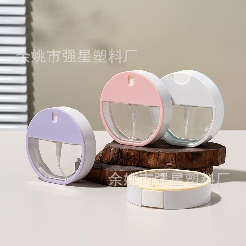 Yuyao manufacturer's 35ml round card-style spray bottle, perfume dispenser, press-type snap-on spray bottle