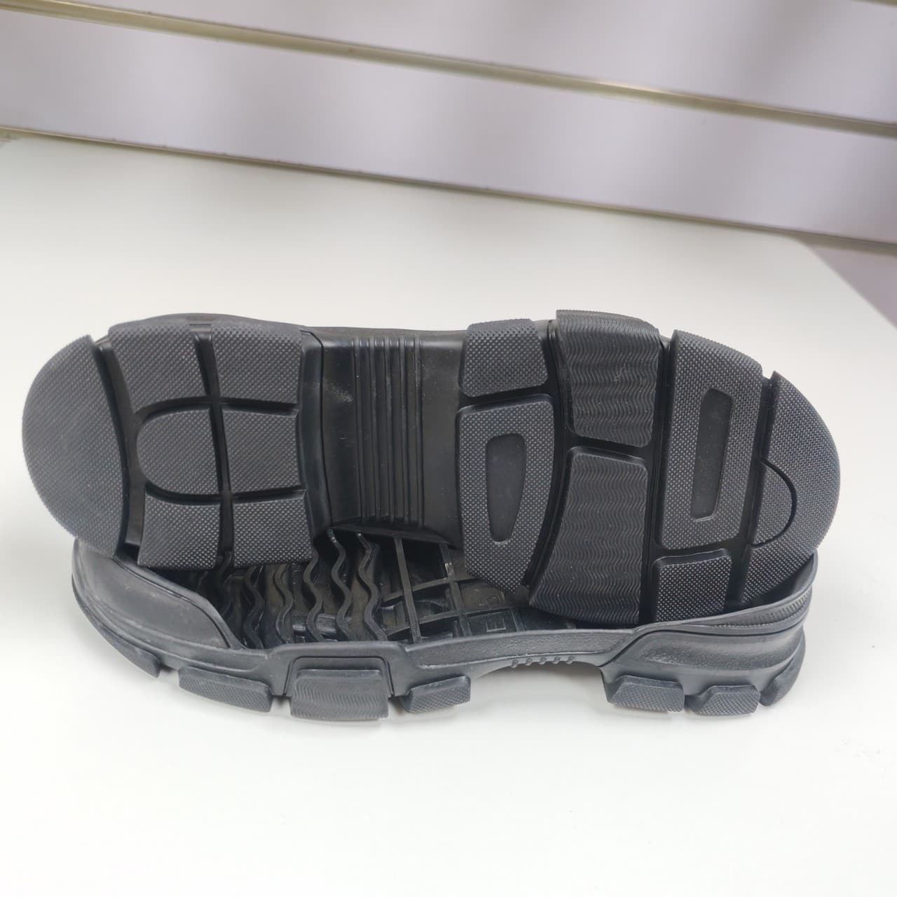 Factory direct wholesale of rubber soles for export and domestic sales, including hiking, couple's, and work shoes. Source manufacturer of rubber shoe soles.