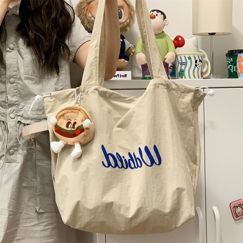 Relaxed Tote Bag Women's 2026 New Drawstring Canvas Bag Commuting Light Tote Bag Large Capacity Shoulder Bag