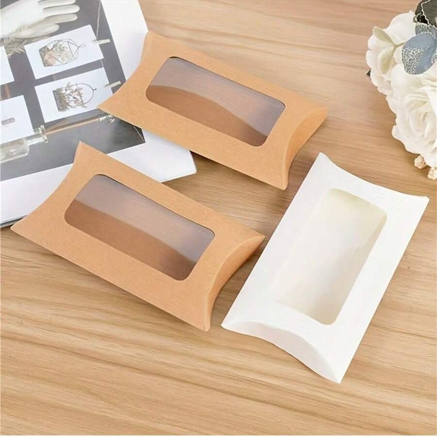 Creative paper gift boxes, kraft paper transparent windowed pillow boxes, wedding candy packaging boxes, candy boxes wholesale.