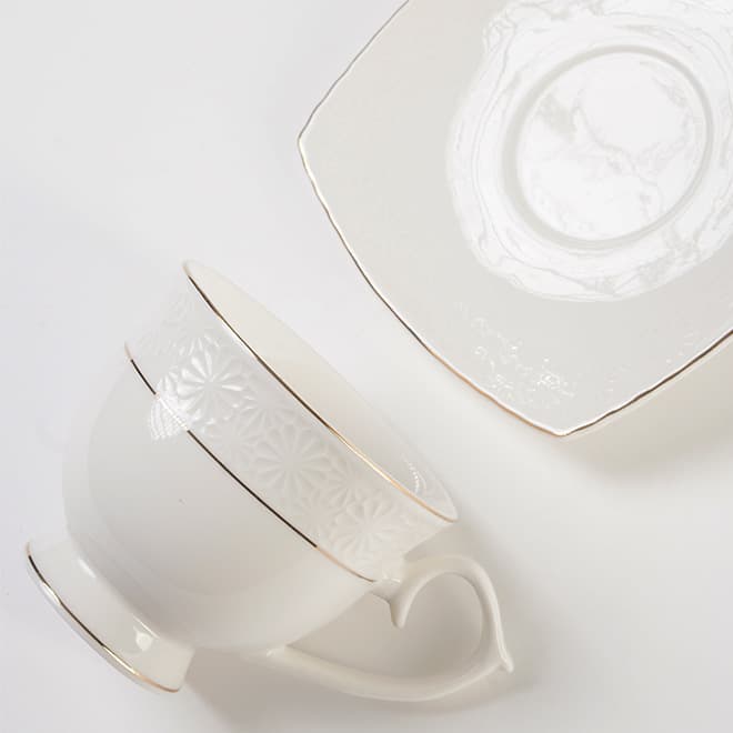 Cross-border Middle East business series gold-painted relief light luxury simple style ceramic cup and saucer pure white high-quality coffee cup and saucer