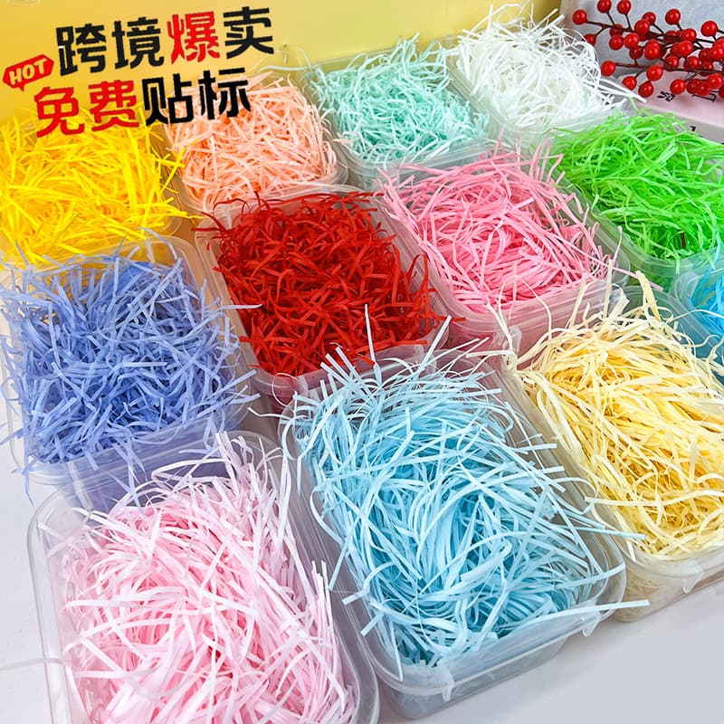 Factory wholesale raffia shredded paper for gift boxes, 20g & 50g, for wedding candy boxes and other decorative paper boxes.