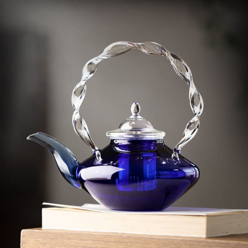 Blue glass teapot high temperature resistant Japanese simple pink butterfly twisted handle teapot heat resistant glass teapot