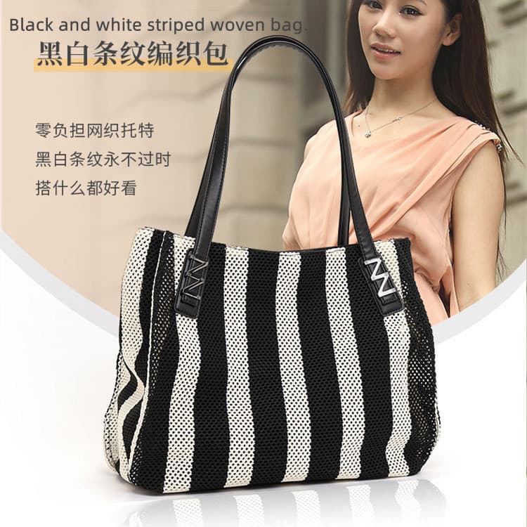 2026 New Style Women's Shoulder Bag Fashion Black and White Striped Hollow Woven Bag Large Capacity Commuter Underarm Tote Bag