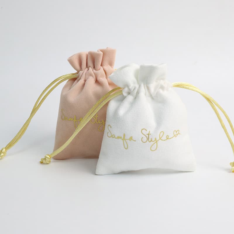 Gold foil stamping on handbags and luggage, gold Christmas prints, silver foil stamping on clothing, crystal labels, printed designs, special lettering.