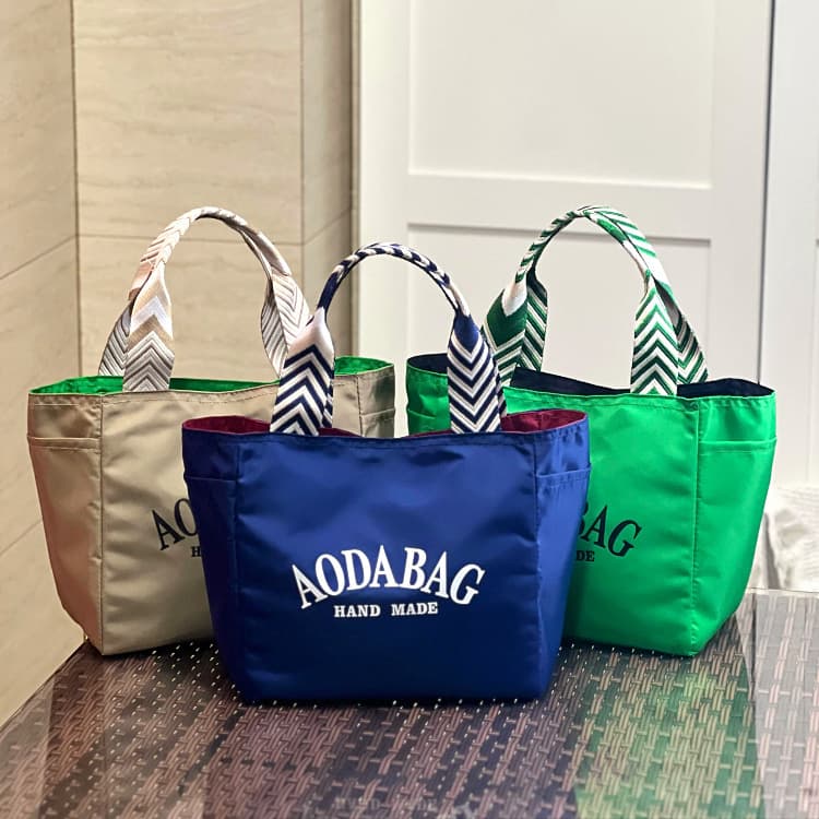 New niche contrasting color dopamine simple letter large capacity handbag mommy bag work commuting handbag for women