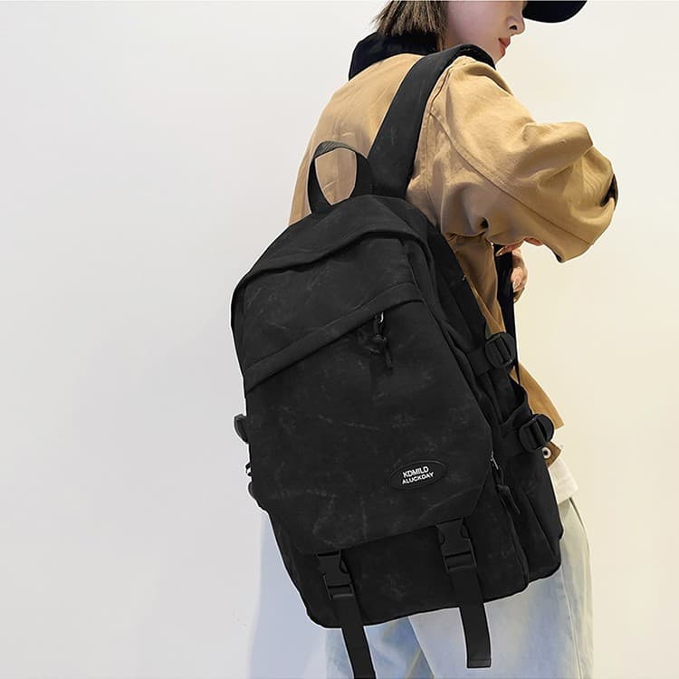 Female middle school student and college student backpack, large capacity, versatile, simple backpack, niche design, graffiti school bag for girls