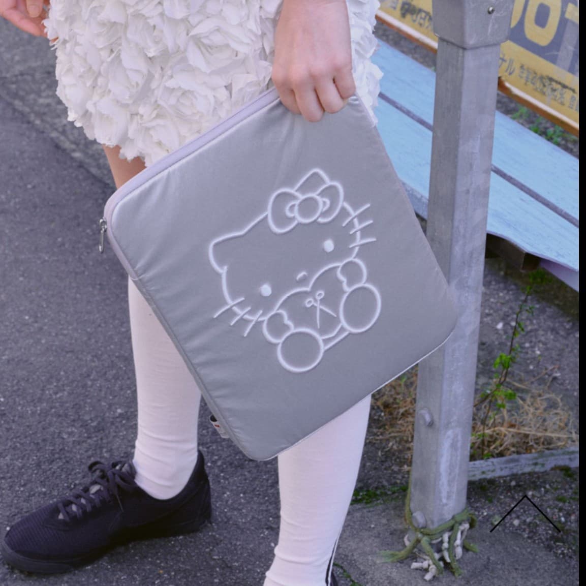 KAZUM laptop storage bag with embroidered Hello Kitty design, as seen on Korean Instagram influencers.