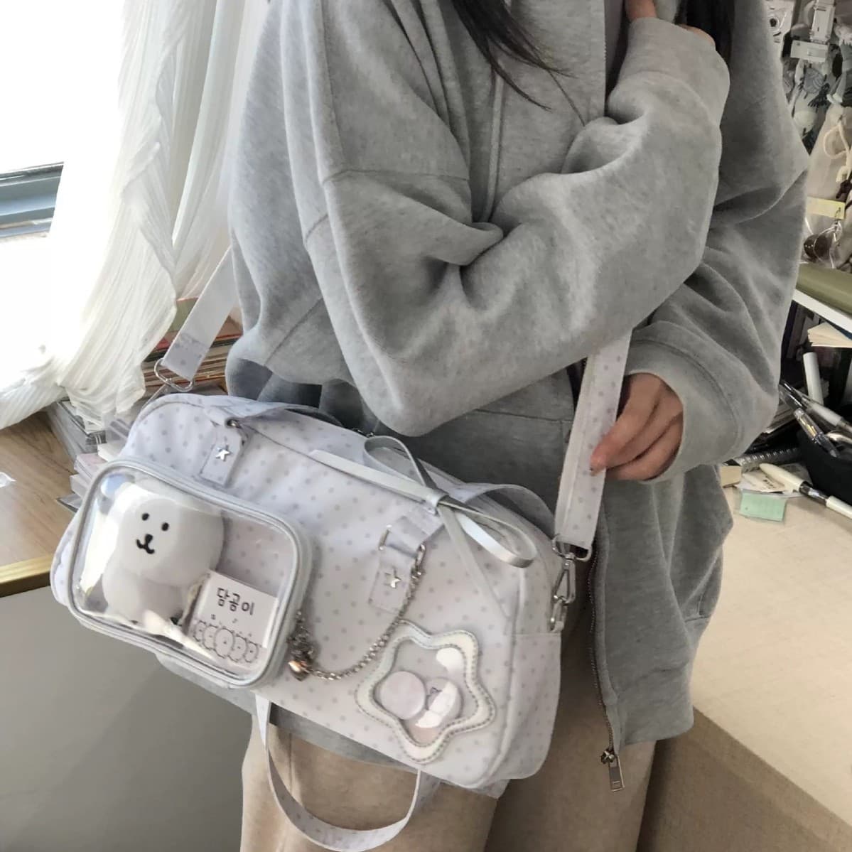 Korean-style anime-inspired milk white polka dot ita bag, soft and cute transparent doll bag design, single-shoulder bag for students, conventions, and fandom