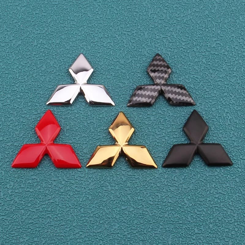 Suitable for GAC Mitsubishi steering wheel logo Outlander Ege Outlander Xinjinxuan steering wheel logo middle car logo car