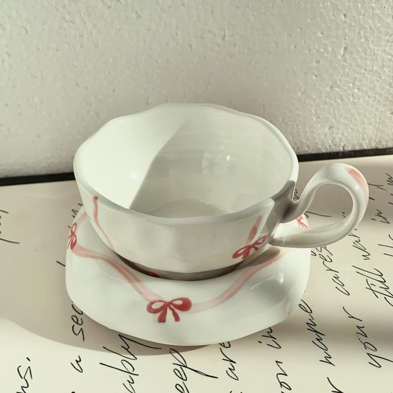 Cross-border exclusive ins-style hand-kneaded ceramic coffee cup, hand-painted bow cup and saucer, afternoon tea latte flower cup