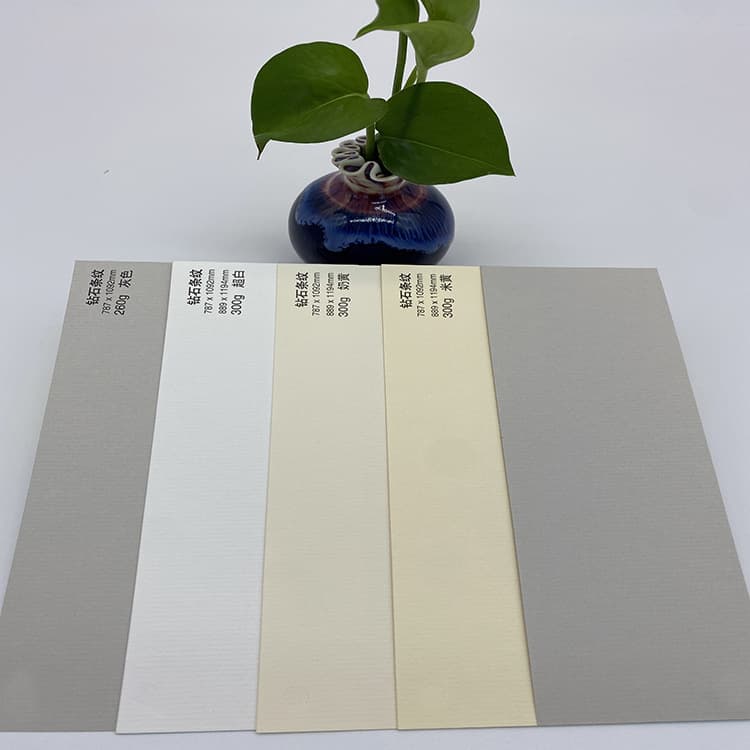 Specialty papers including art paper, patterned paper, Conqueror watermarked paper, cover paper, endpaper, and mounting paper.