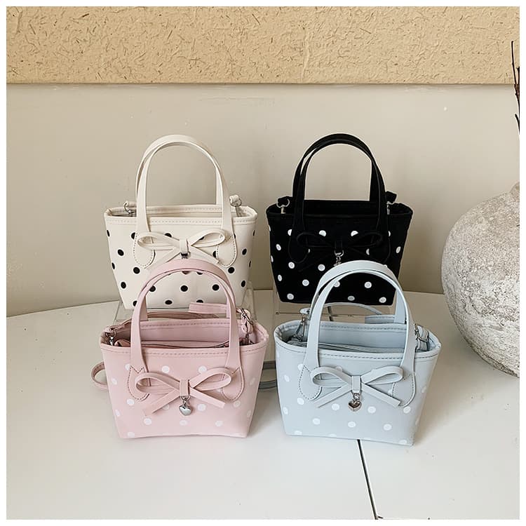 Sweet bow girls shoulder bag, stylish polka dot baby handbag, 2026 new mini children's bag