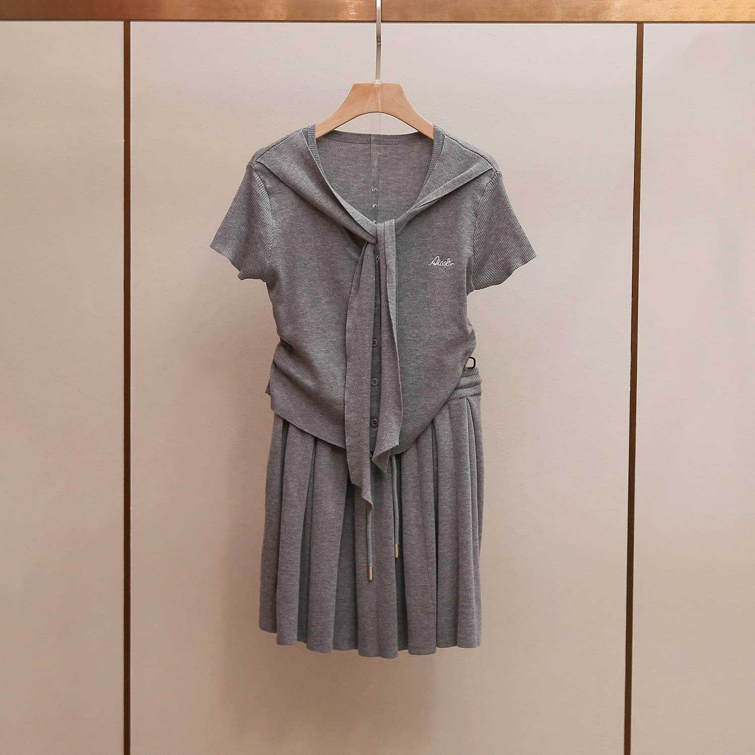 Shenzhen Nanyou High-End Women's Summer New Arrival College Style Age-Reducing Tie-Neck Short-Sleeve Top + Skirt Set