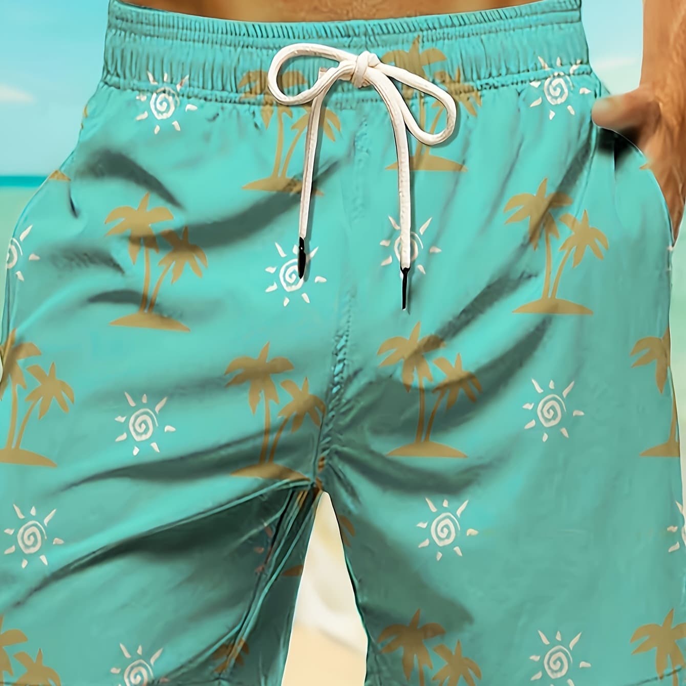 Cross-border European and American style loose casual shorts, cyan base with coconut tree and sun simple print, drawstring beach shorts wholesale